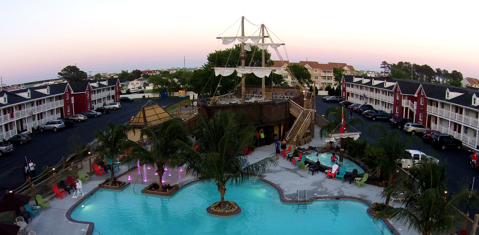 caribbean themed pool with large pirate ship