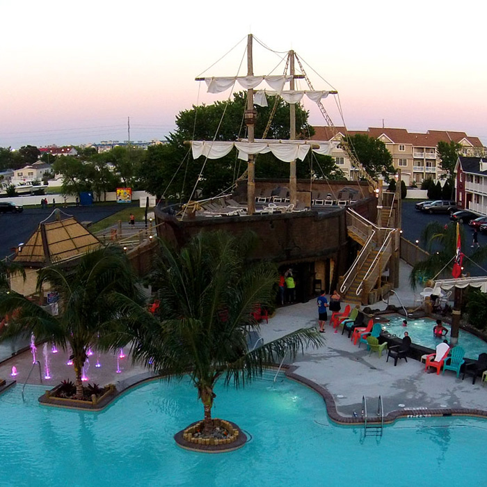 caribbean themed pool with large pirate ship